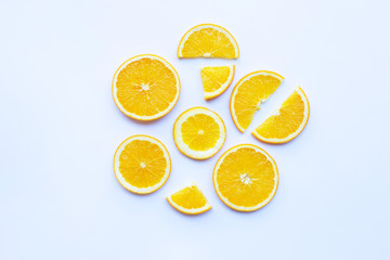 Orange fruit slices on white