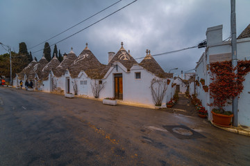 ALBEROBELLO, APULIA, ITALY - FEBRUARY 03 - Beautiful view of the traditional trulli houses with...