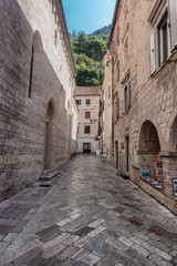 Fototapeta na wymiar Small streets and shops in Kotor city in Montenegro