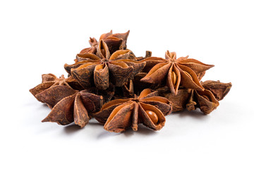 heap of anise stars isolated on white background