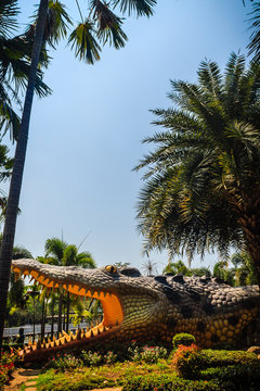 Scary Chalawan crocodile statue at Bueng Si Fai, the public park with lake at Muang district, Pichit province, Thailand. Chalawan is a fearsome crocodile lord in the local legend in Thailand's Phichit