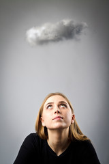 Young woman in black and small cloud.