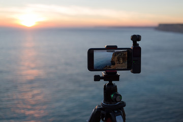 Tripod-mounted camera at Algarve, Portugal