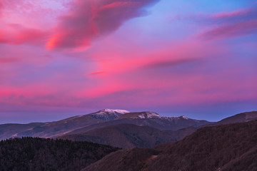 Fototapeta na wymiar Colorful purple sunrise in the mountain