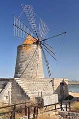 Windmills in salt pans of Trapani Sicily, Italy.