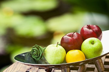 Thai exotic tropical fruits in luxury silver basket, welcome fruit basket in hotel