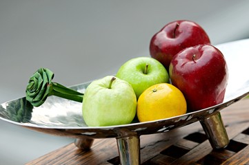Thai exotic tropical fruits in luxury silver basket, welcome fruit basket in hotel