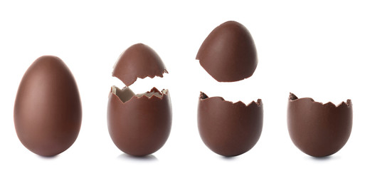 Set of delicious chocolate Easter eggs on white background