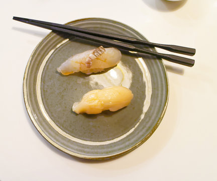 A plate of fluke fish sushi in Yasu Omakase Sushi Bar in Toronto, Canada
