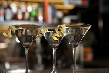 Glasses of lemon drop martini cocktail in bar