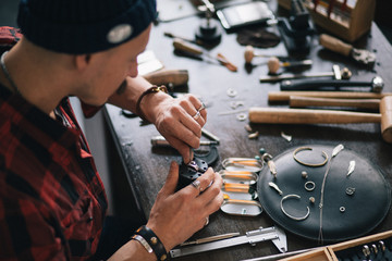craftsman engraving the stone. close up cropped photo