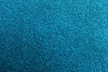 Closeup view of sparkling blue glitter background