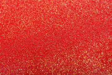 Closeup view of sparkling red glitter background