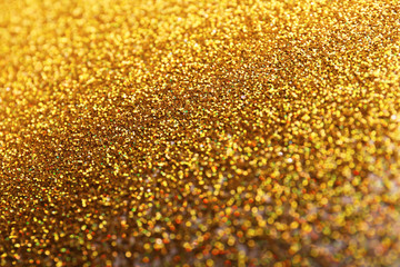 Closeup view of sparkling golden glitter background