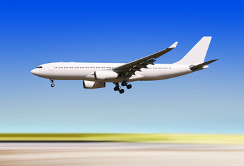 Fototapeta na wymiar plane landing over runway of airport