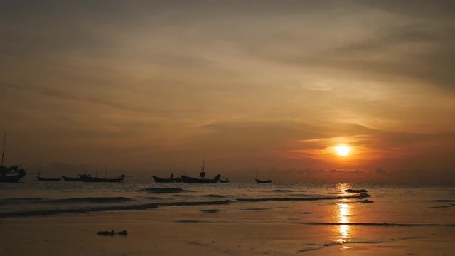 Sunset at the sea and beach with copy space at Chao Lao Beach, Chanthaburi Province, Thailand.