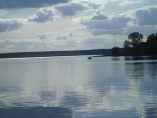 river and fisherman in a boat