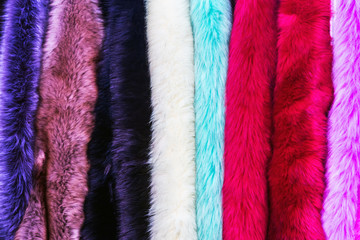 samples of different color of fur fabrics color background. Textile industry