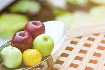 Thai exotic tropical fruits in luxury silver basket, welcome fruit basket in hotel