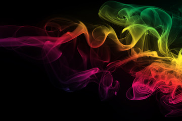 colorful smoke on black background and darkness concept, fire design