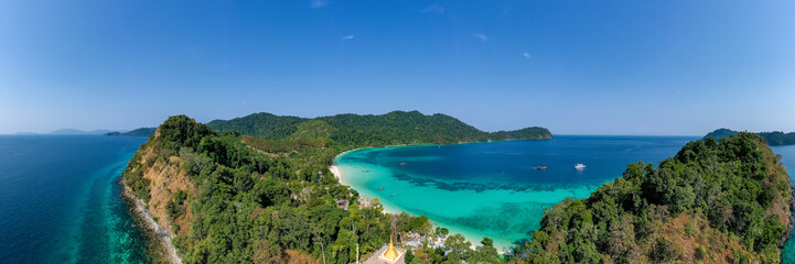 Panoramic aerial view of a small Moken fishing village on a remote tropical island in the Mergui Archipelago