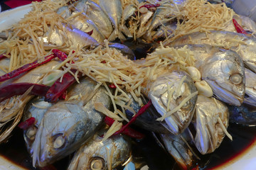 oiled sweet and salted mackerel fish with dried chili, ginger, and garlic