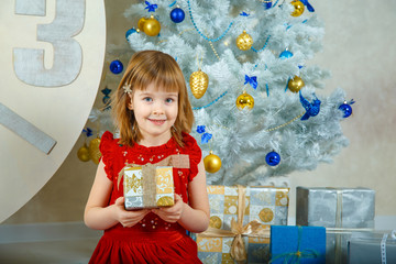 Girl Masha holding a box with a gift.