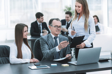 business team discussing with the head of financial data