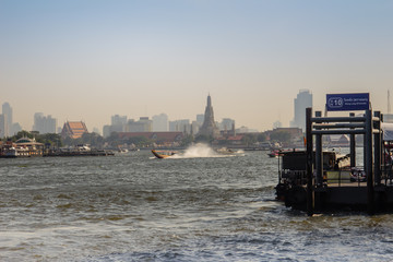 Waterway traffic in Chao Phraya River. The Chao Phraya Express Boat, a transportation service in...
