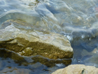 Stone in water