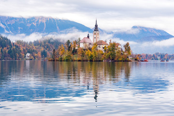Fototapeta na wymiar Beautiful autumn landscape around Lake Bled with Pilgrimage Church of the Assumption of Maria