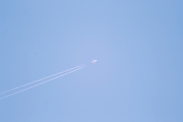 Little plane on the blue sky.