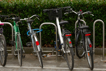 Fototapeta na wymiar Bicycles parked and locked in different places in the center of the city of Vitoria-Gasteiz (Alava) Basque Country, Spain.