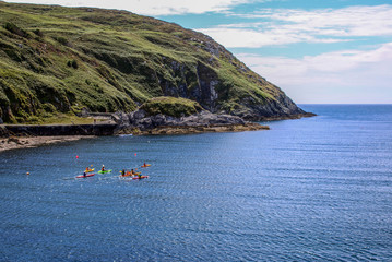 Kayaking on the Atlantic ocean and around the West cork Islands on a sunny summer afternoon. 