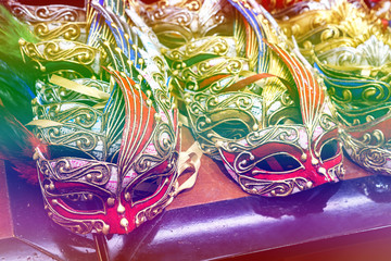 Colored mask at carnival in Venice, Italy. Venice carnival masks. selective focus, toned