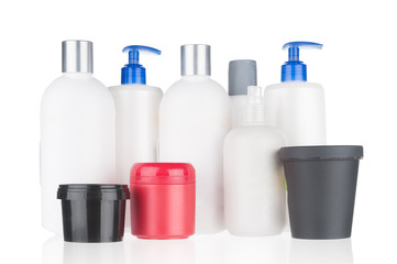 Set of cosmetic bottles isolated on white background