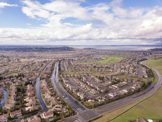 Aerial shot of Folsom, California with Folsom Lake in background.