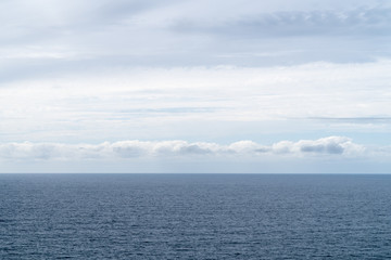 Obraz premium Blue and white sky with clouds over sea Nature composition Background, landscape