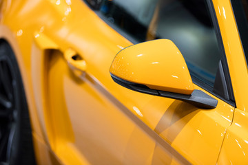 Wing mirror on a modern luxury sports car
