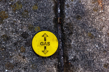 gasline indicator in sidewalk