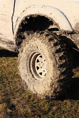 Fototapeta na wymiar Ukrainian offroad competition in the city of Kamyanets Podilsky. Swamp and mud on cars. Produce large puddles