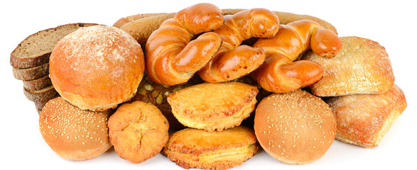 Bread and bakery products isolated on white background. Wide photo.