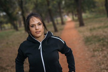 jogger woman posing in park