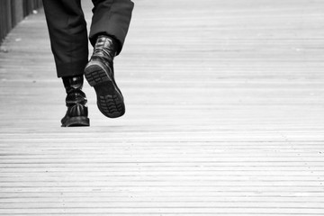 soldier walk on the wood floor - monochrome