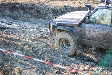 Ukrainian offroad competition in the city of Kamyanets Podilsky. Swamp and mud on cars. Produce...