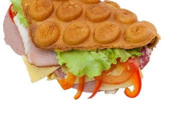 Fast food, street food Hong Kong, Thai waffle with ham, pepper, lettuce, tomato and cheese close-up on a white background. Background with space to insert text.