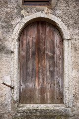 Old wooden door in old building.