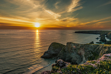 Beautiful dusk sunset of Bedruthan Steps rock stacks in Cornwall, UK