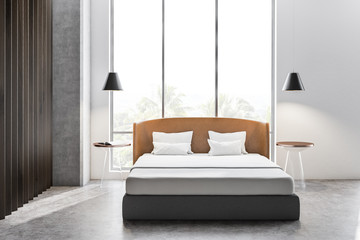 Concrete and wooden bedroom interior