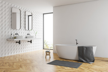 Fototapeta premium White bathroom corner, tub and sinks